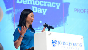 Hahrie Han speaking at a podium.